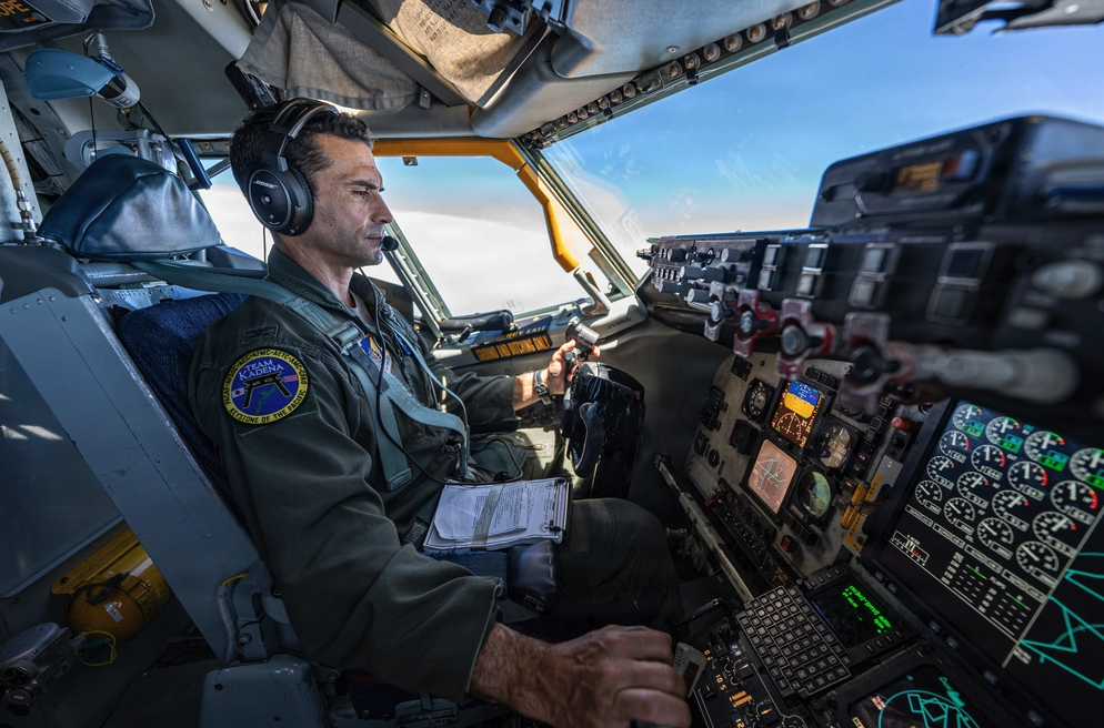 A US Air Force aircrew member operates mission systems aboard a military aircraft. Photo: Airman 1st Class Arnet Tamayo/DVIDS
