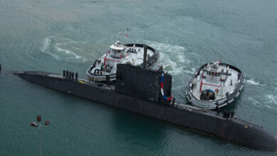Her Majesty's Canadian Submarine (HMCS) Victoria arriving in rainy morning at Pearl Harbor, Hawaii. Twenty-two nations, more than 40 ships and submarines, more than 200 aircraft and 25,000 personnel are participating in RIMPAC exercise from June 29 to Aug. 3, in and around the Hawaiian islands. The world's largest international maritime exercise, RIMPAC provides a unique training opportunity that helps participants foster and sustain the cooperative relationships that are critical to ensuring the safety of sea lanes and security on the world's oceans. RIMPAC 2012 is the 23rd exercise in the series that began in 1971. (Photo by: Jacek Szymanski)