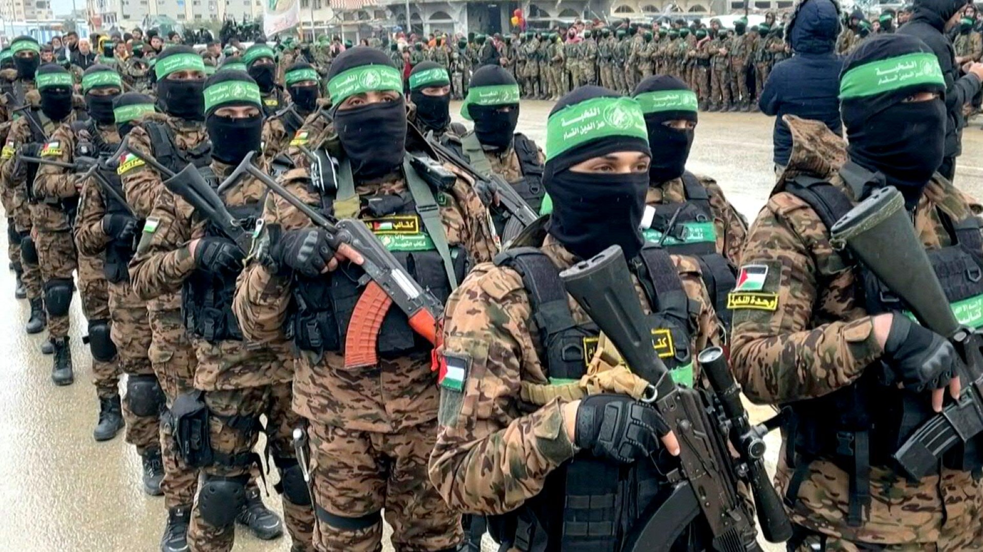 Members of Hamas's armed wing, the Ezzedine al-Qassam Brigades, take part in a formation in Khan Yunis, Gaza. Hamas says its agreement with Israel includes provisions on the group's weapons and a gradual withdrawal of Israeli forces from the Gaza Strip. Image: AFP TV