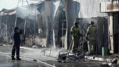 Firefighters extinguish flames and clear debris after a Russian missile strike destroyed a market in Kyiv, Ukraine, on July 30, 2026. The overnight attack was part of a large-scale Russian missile and drone barrage that killed at least eight people across Ukraine. Photo: Sergii Volskyi/AFPTV/AFP
