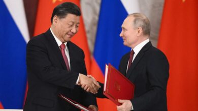 Russian President Vladimir Putin and China's President Xi Jinping shake hands during a signing ceremony following their talks at the Kremlin in Moscow on March 21, 2023.