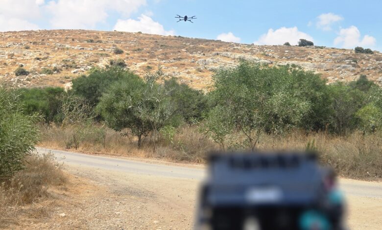 A LiDAR device aimed at an unmanned aerial system